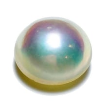 Close-up of a lustrous iridescent pearl