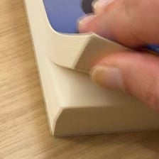 A reader quickly scanning pages of a book.