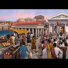 Ruins of an ancient Greek agora with columns and open gathering space.