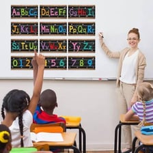 Children learning alphabet letters in a classroom.