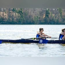 A rowing crew racing in a regatta