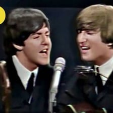 The Beatles performing during the era of “I'm a Loser.”