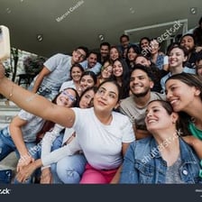 A group of friends taking a selfie together.