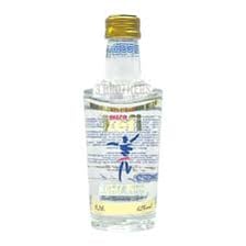 A bottle and glass of Greek ouzo