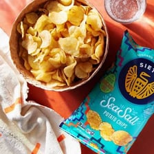 Potato chips seasoned with visible sea salt.