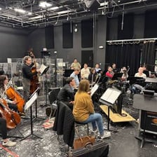 Oboist playing in an orchestra