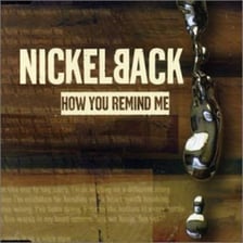 Nickelback performing on a concert stage