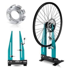 A bicycle wheel being checked for proper alignment.