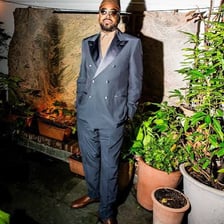 A person confidently showing off an impressive outfit.