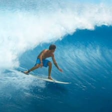 A surfer riding an ocean wave
