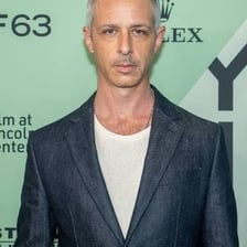 An illustration combining actor Jeremy Strong with a strong arm.