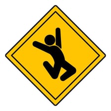 A humorous illustration styled like a road-safety warning