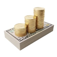 Coins and financial documents representing wealth