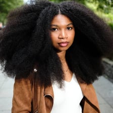 People displaying rounded, naturally textured afro hairstyles.