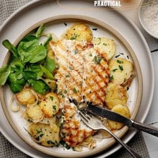 A plated dish prepared in a specified culinary style