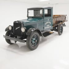A vintage REO Speed Wagon truck.