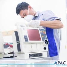 A portable defibrillator used in emergency cardiac care