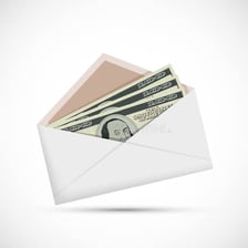 An envelope of cash being passed as a bribe.