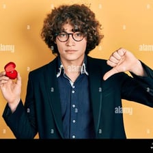 A person signaling rejection with a thumbs-down gesture