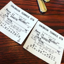 A horse-racing betting ticket showing an exact-order wager.