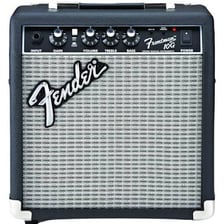 A Fender electric guitar beside a guitar amplifier.