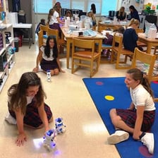 Students of typical middle-school age in a classroom