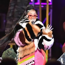 Cardi B performing onstage.
