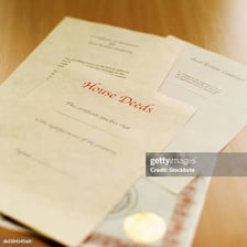Legal property deed document on a desk
