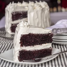 A single slice cut from a frosted cake