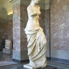 The Venus de Milo marble statue displayed at the Louvre