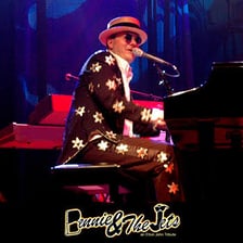Elton John performing “Bennie and the Jets”