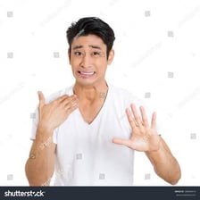 A person signaling another person to stop