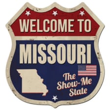A sign displaying Missouri’s Show-Me State slogan