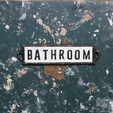 Restroom entrance in a traditional British pub