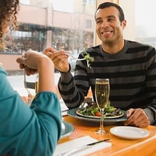 A person eating a meal at home rather than dining in a restaurant.