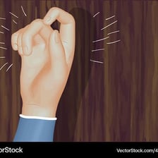A hand making a rapid knocking sound on a door