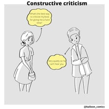 A person pointing out a minor flaw during a conversation.