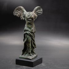 A statue or artistic depiction of Nike, the Greek goddess of victory.