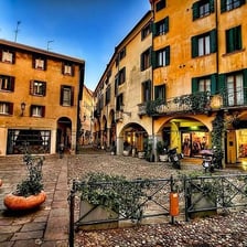 A historic street scene in Padua, Italy