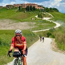 Cyclists traveling through scenic countryside