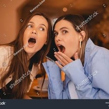 A person reacting with visible surprise.