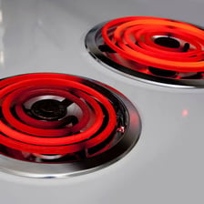 A stovetop burner set to a high heat level.