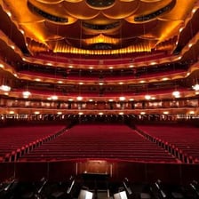 The Metropolitan Opera House hosts an opera performance.