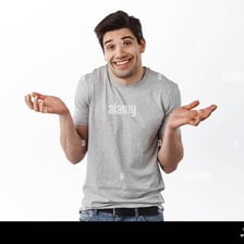 A person reacting sheepishly after making an error