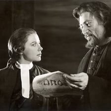 A theatrical depiction of Portia delivering her courtroom speech in The Merchant of Venice