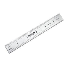 A ruler and benchmark symbol representing an accepted standard.