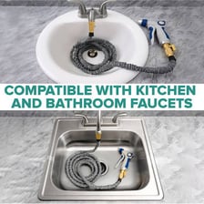 Flexible hoses attached to a household faucet.