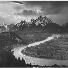 A black-and-white American landscape photograph by Ansel Adams.