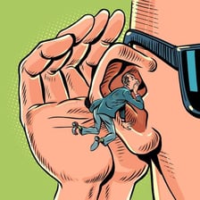 A person secretly passing information to another person.