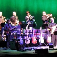Steely Dan performing on a concert stage